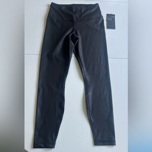 Never worn before. 90 degree by reflex cracked black, leather looking leggings.